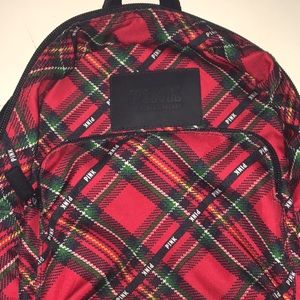 pink victoria’s secret mini backpack.